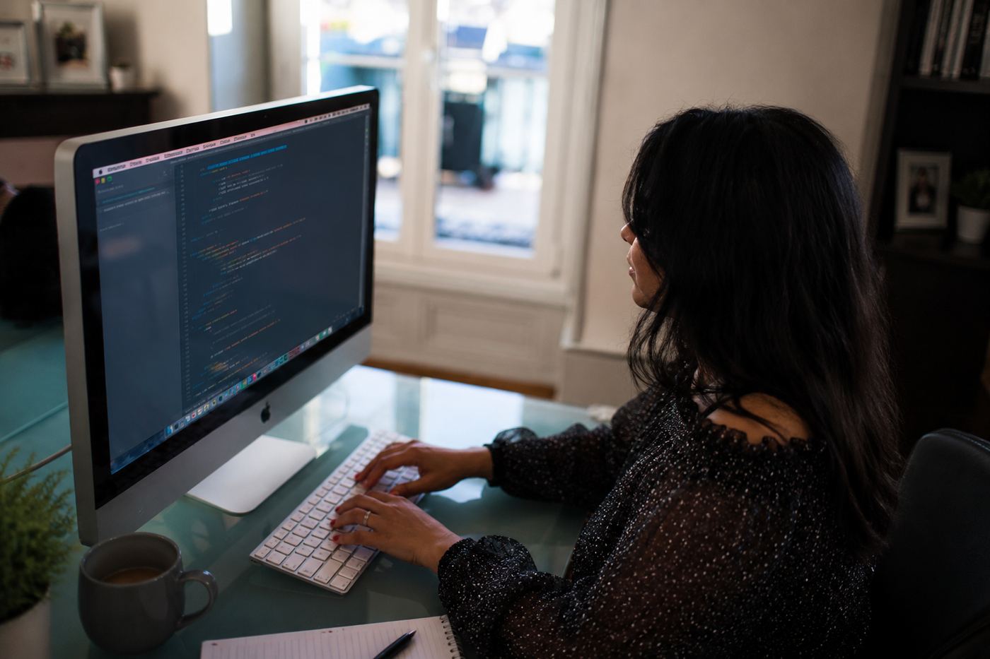 Sindhukumari working at her desk